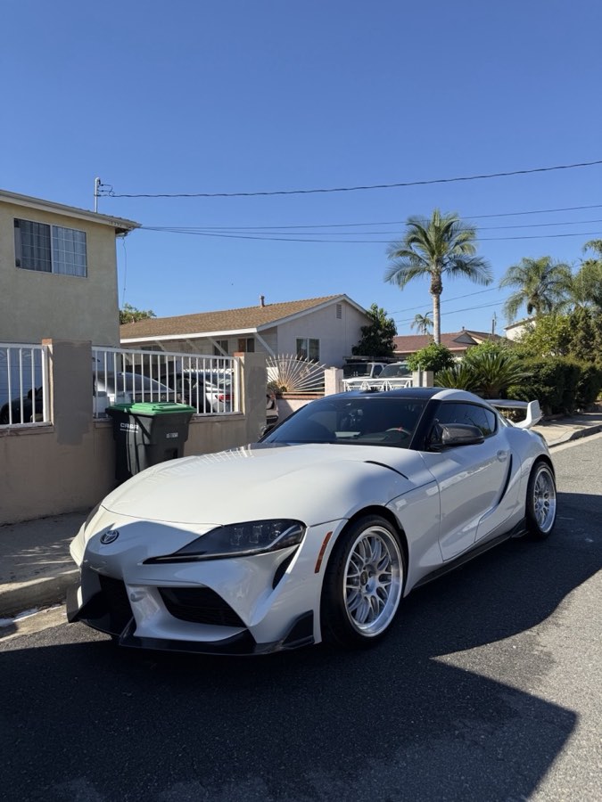 White Toyota Supra after a hand wash