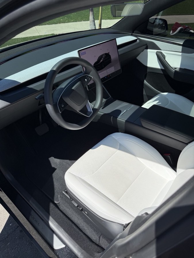 White Tesla Model Y interior after detailing